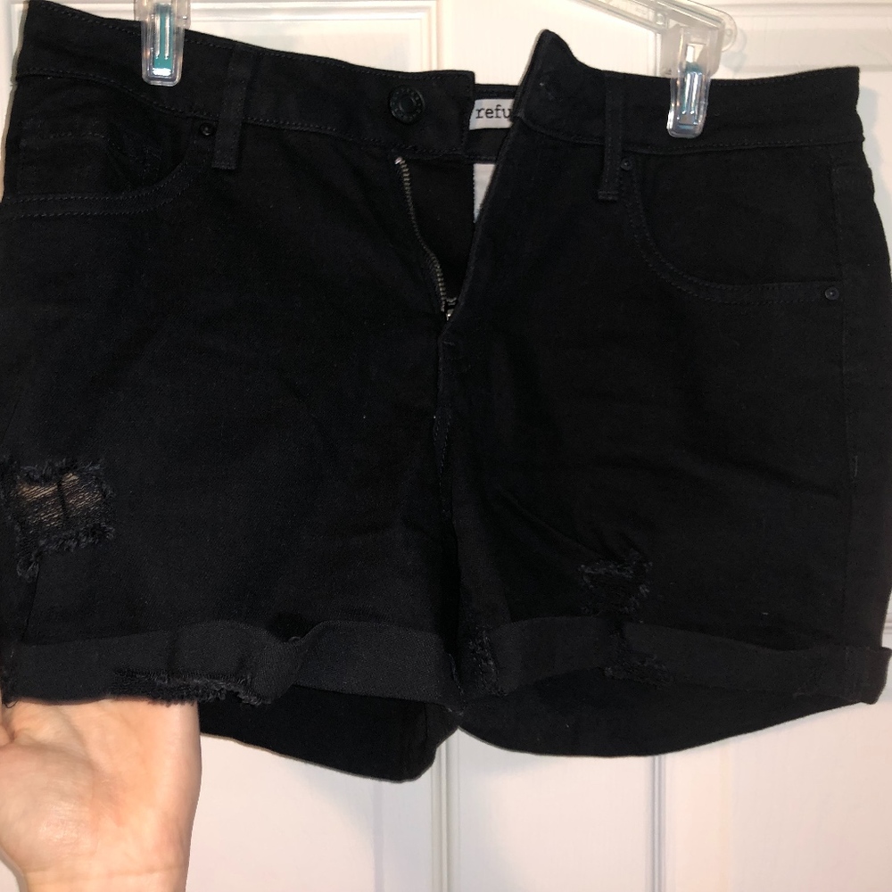 Distressed black shorts